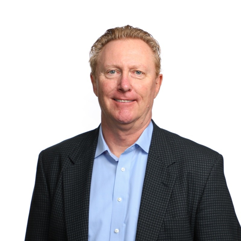 A headshot of Jeff Nicoll. Avidex Sales Director, looking at the camera in a black sports coat